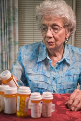 womanpillbottles.jpg